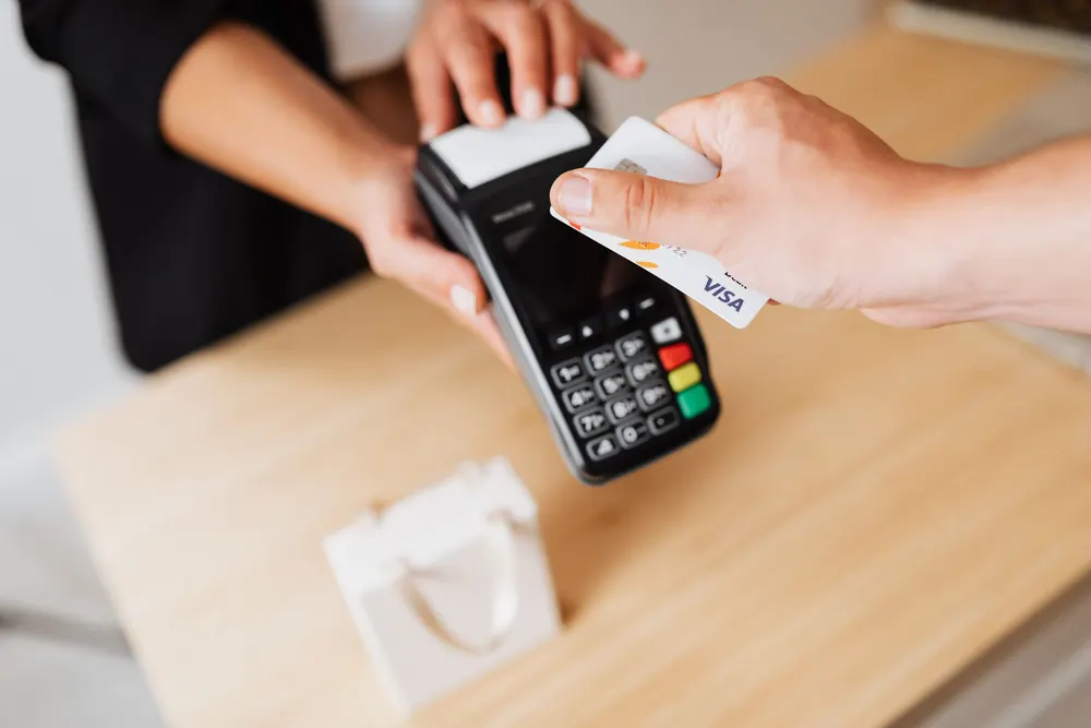 A card being tapped on a payment terminal